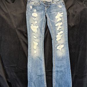 Light wash ripped Silver brand jeans